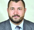 د. علي العشي 